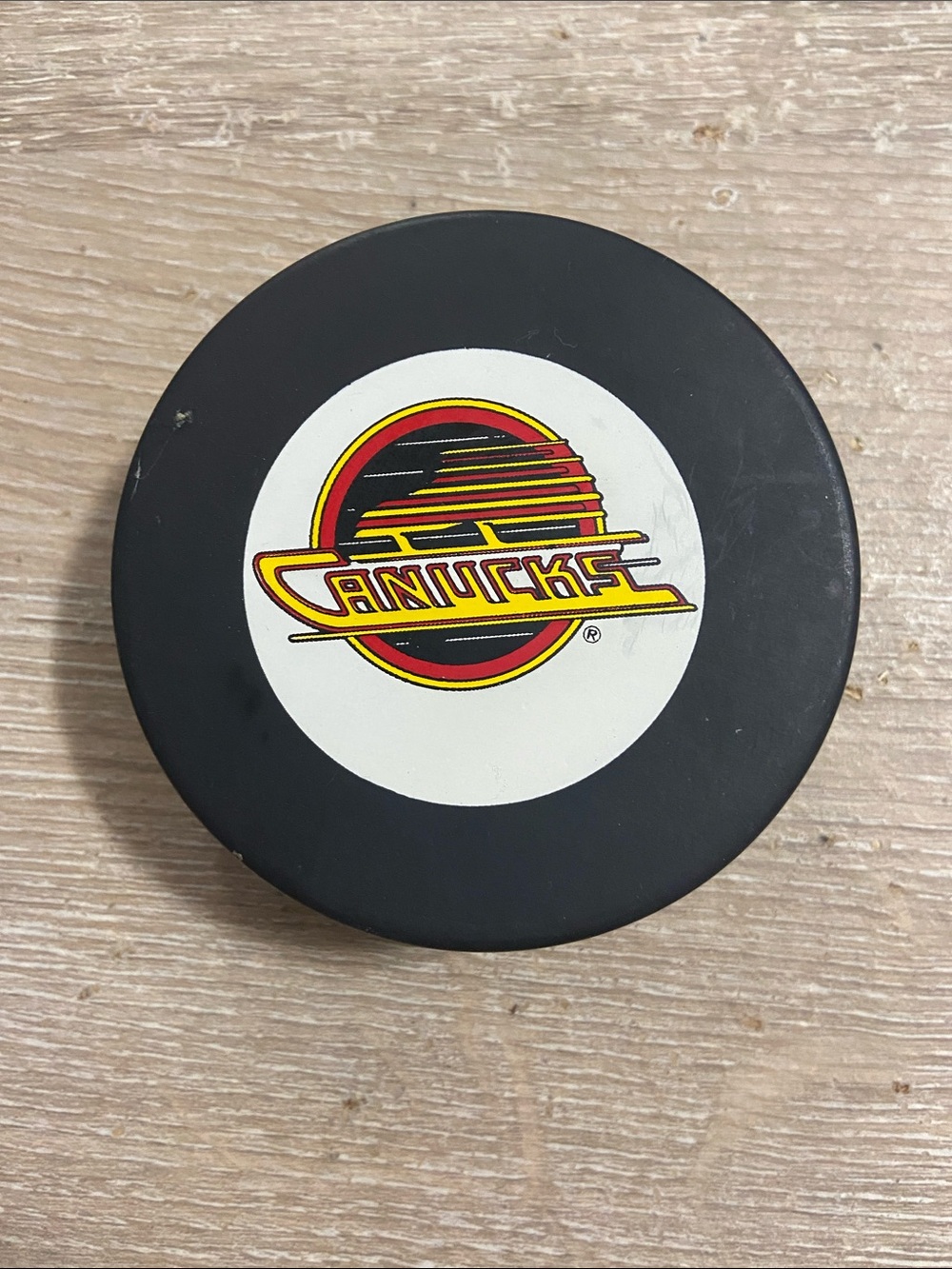 VTG Vancouver Canucks NHL Official Game Hockey Puck Canada Trench John Ziegler